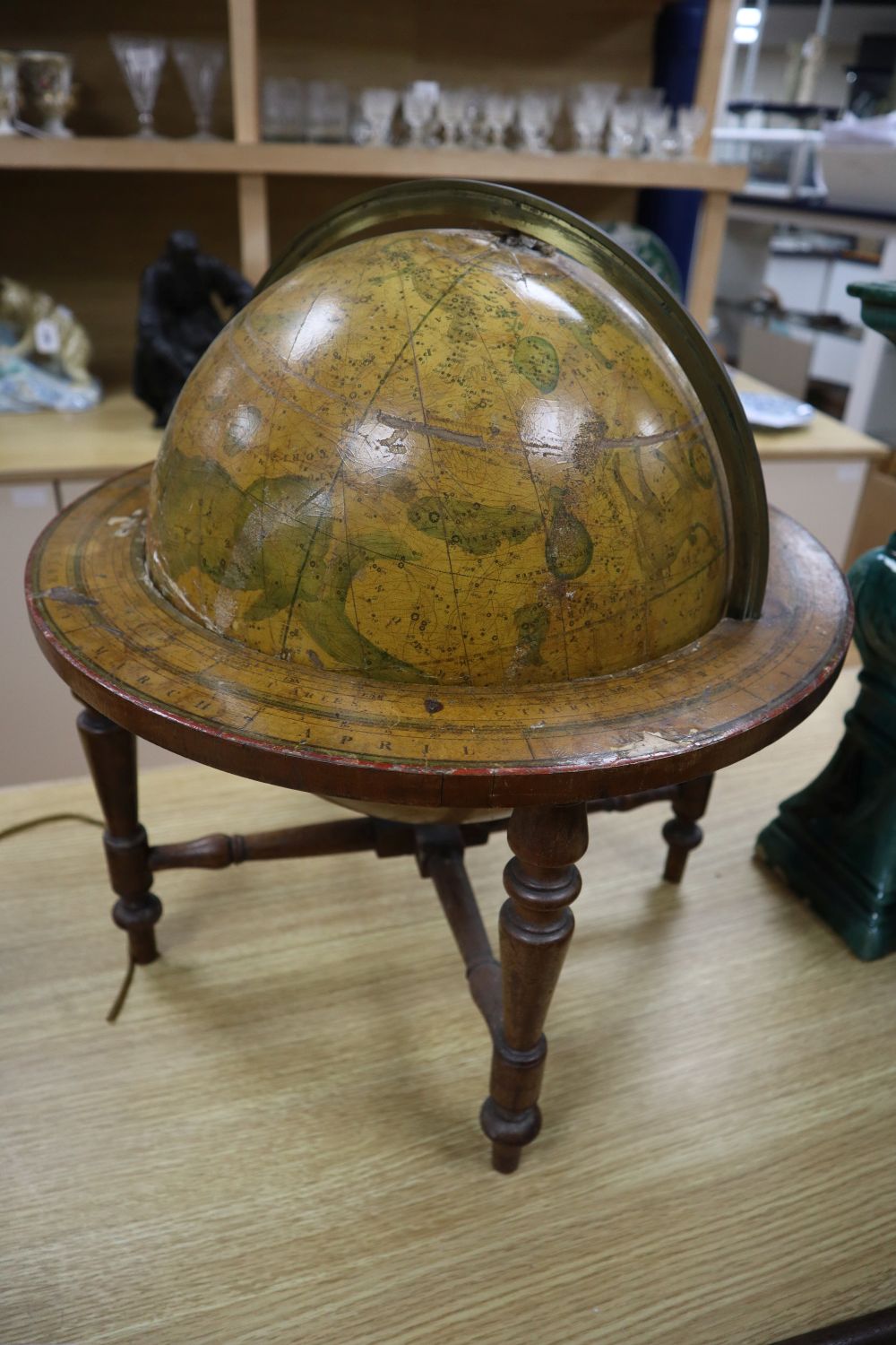 An early 19th century Smiths Celestial table globe, height 46cm (a.f.)